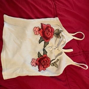 Size small, really cute crop top, white with roses
